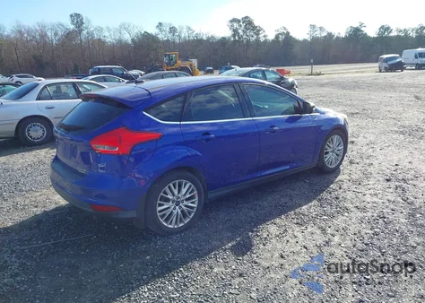 2015 Ford Focus Titanium z USA, uszkodzony, nr VIN 1FADP3N26FL205067